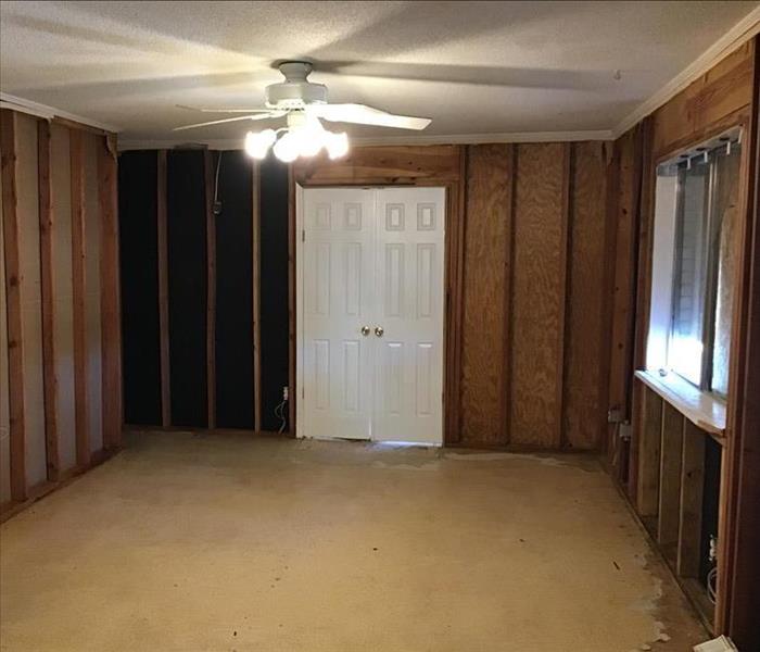 Room With removed drywall and materials